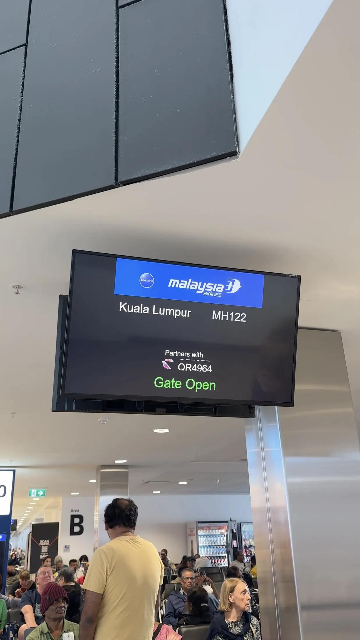 The gate screen showing MH122 to Kuala Lumpur… gate open!