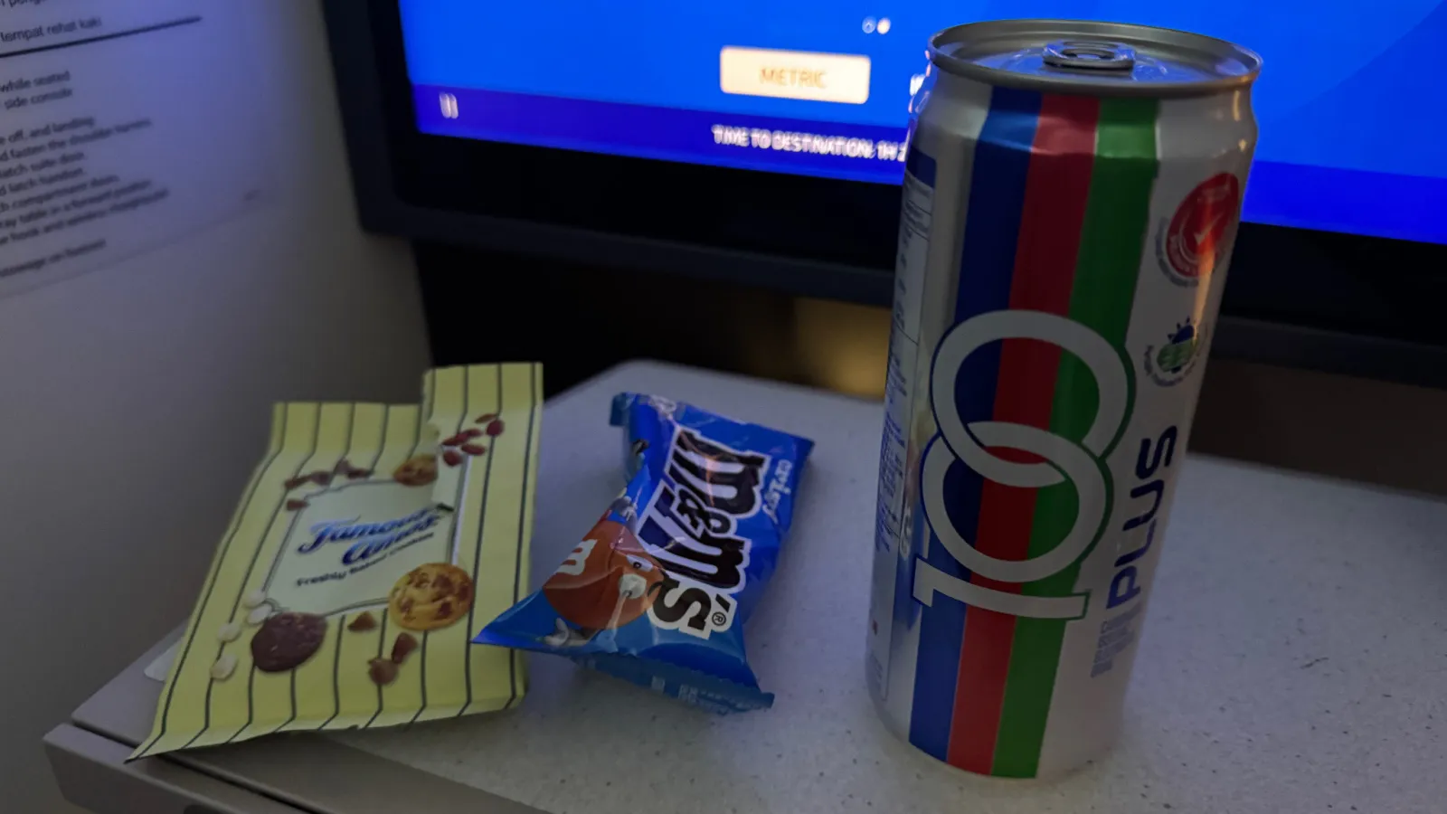 My snack run: a can of 100PLUS, M&M’s and cookies.