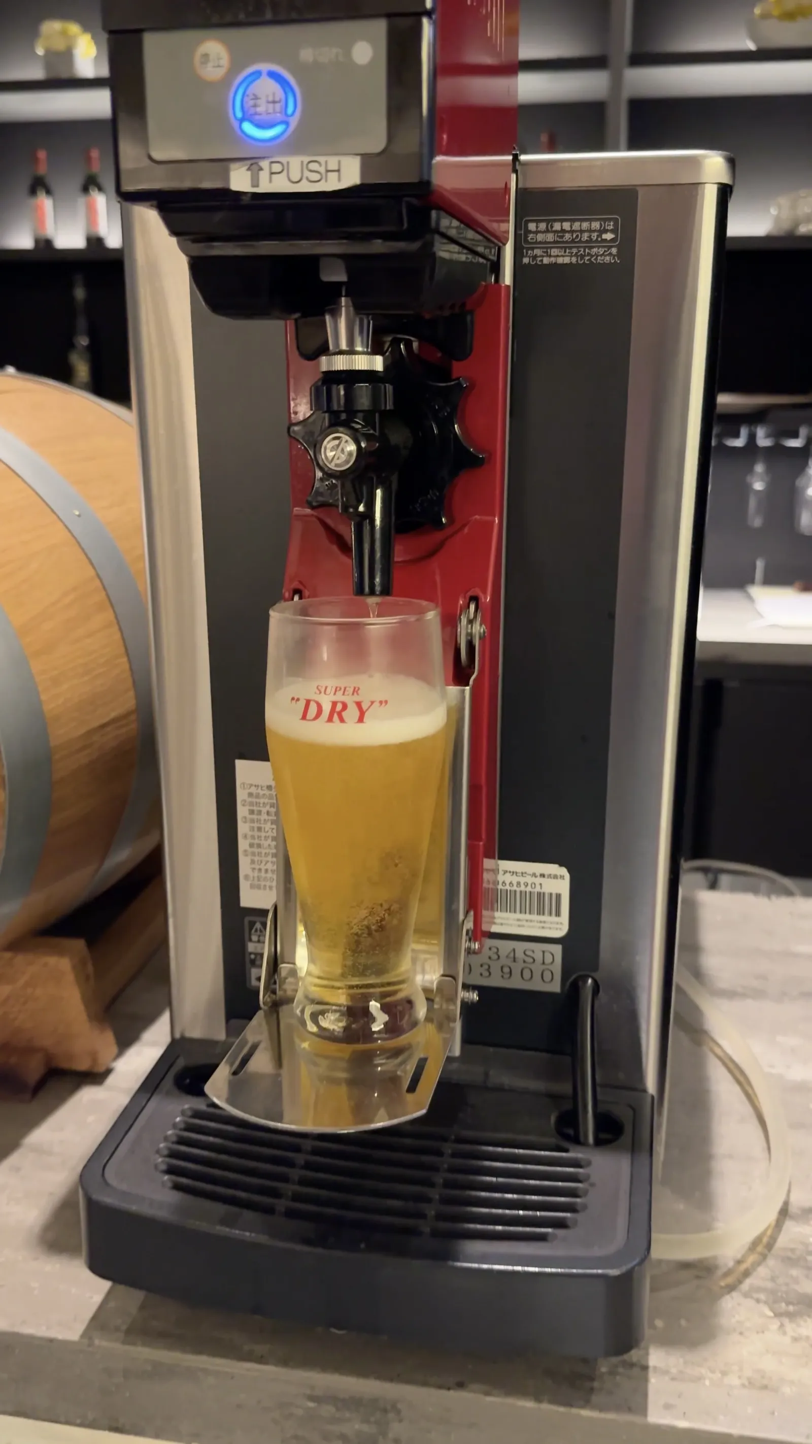 The beer dispenser doing the initial pour.