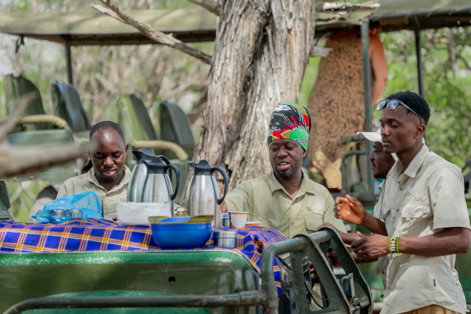 Mr. Martin (middle) with the safari team at our tea and coffee break. Photo by Ahmed Rawahy.