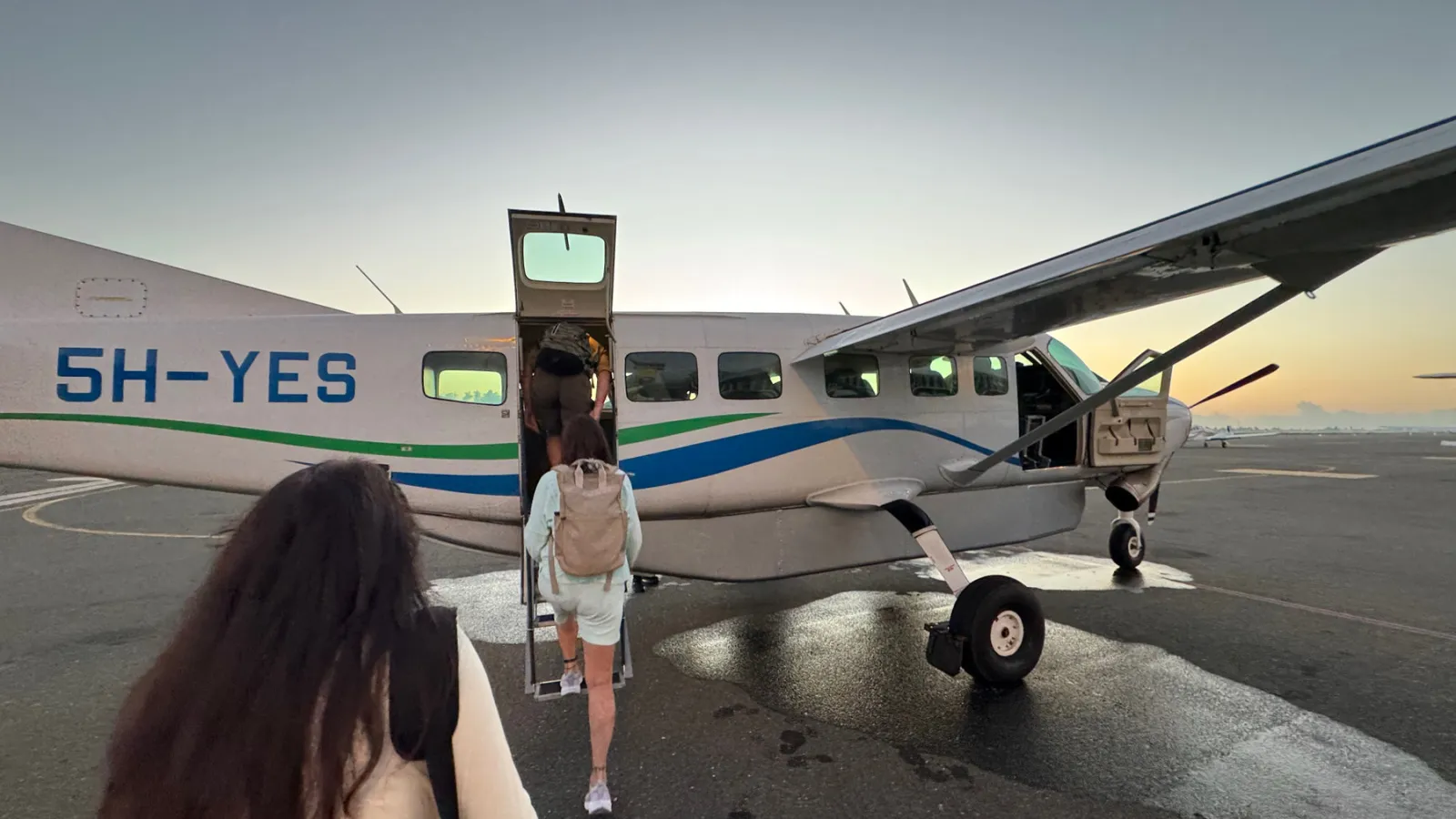 Boarding our Cessna 208B Grand Caravan at Zanzibar Airport before the morning safari flight.