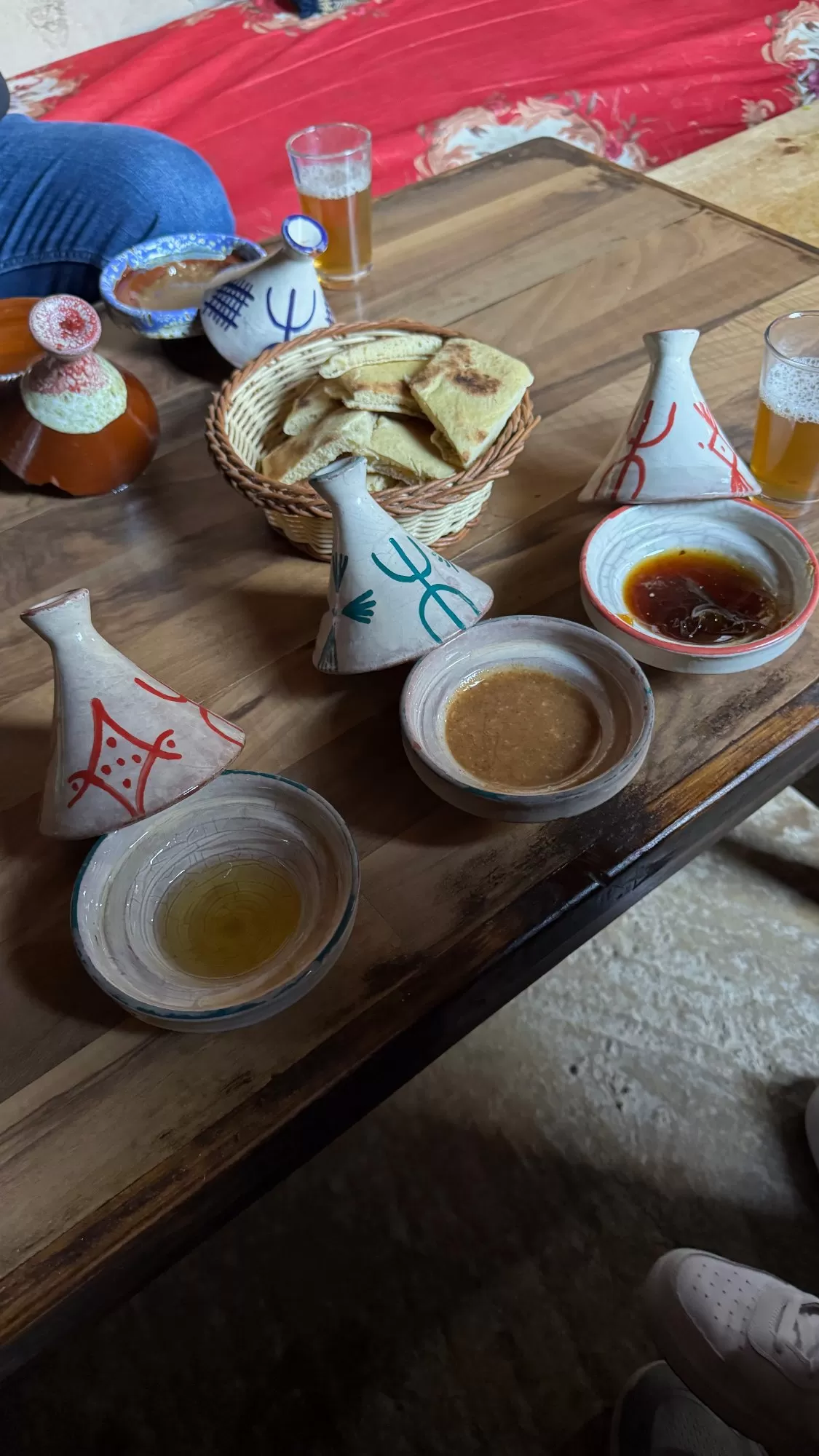 Our warm bread with our choice of dipping sauces: Local honey, almond butter mix, and local argan oil... all presented in mini tagines! 