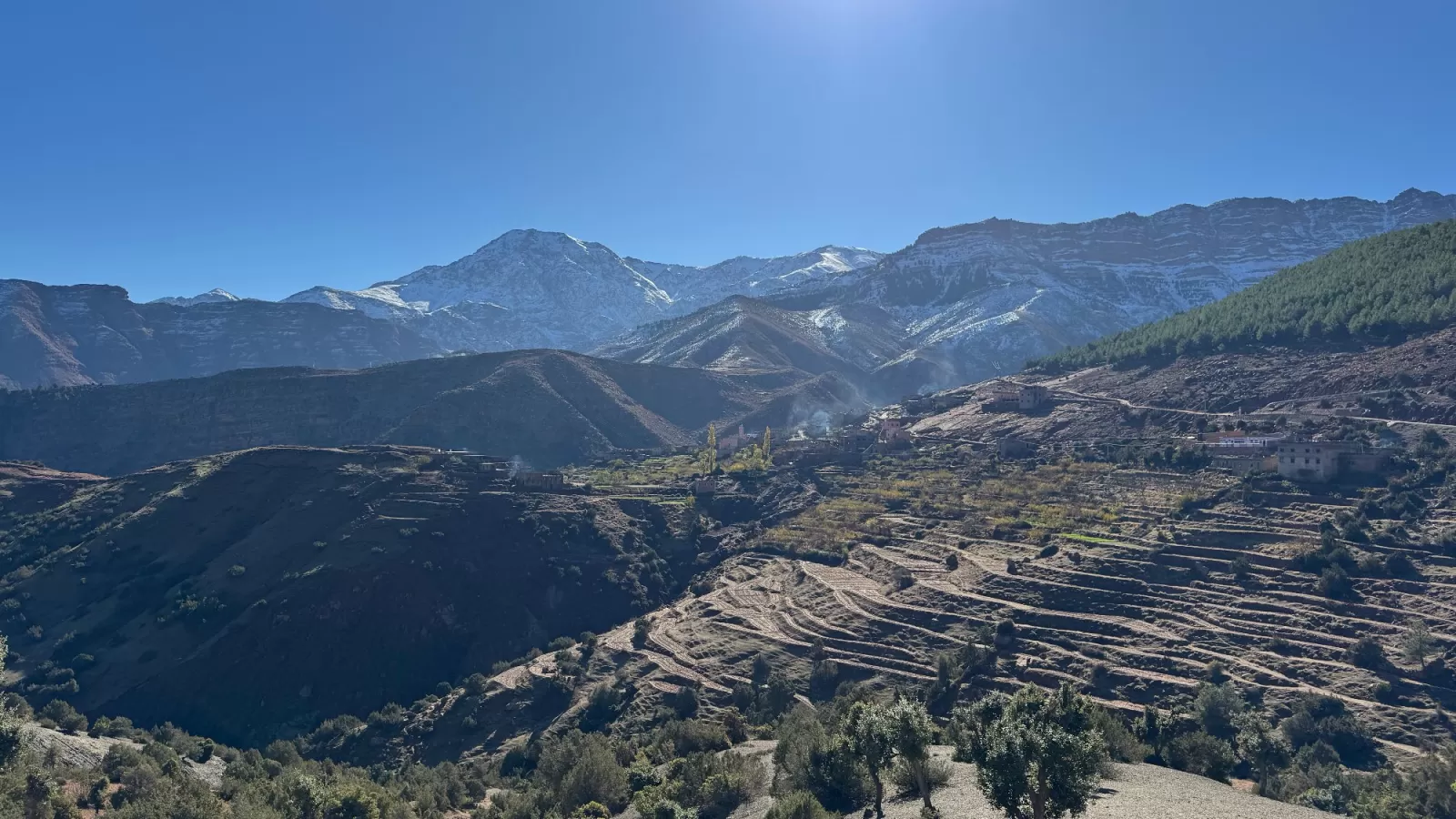 Snow-capped Atlas Mountains in the distance, beautiful day for a tour!